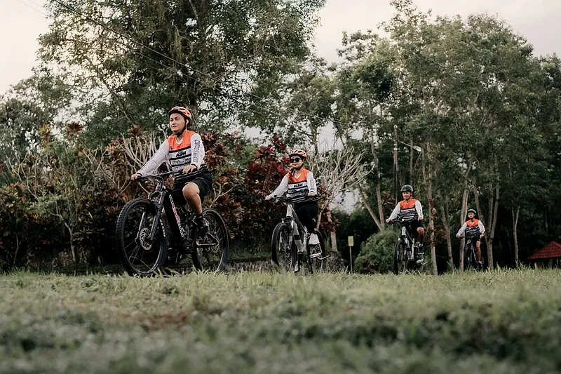 Cyclists riding through the countryside
